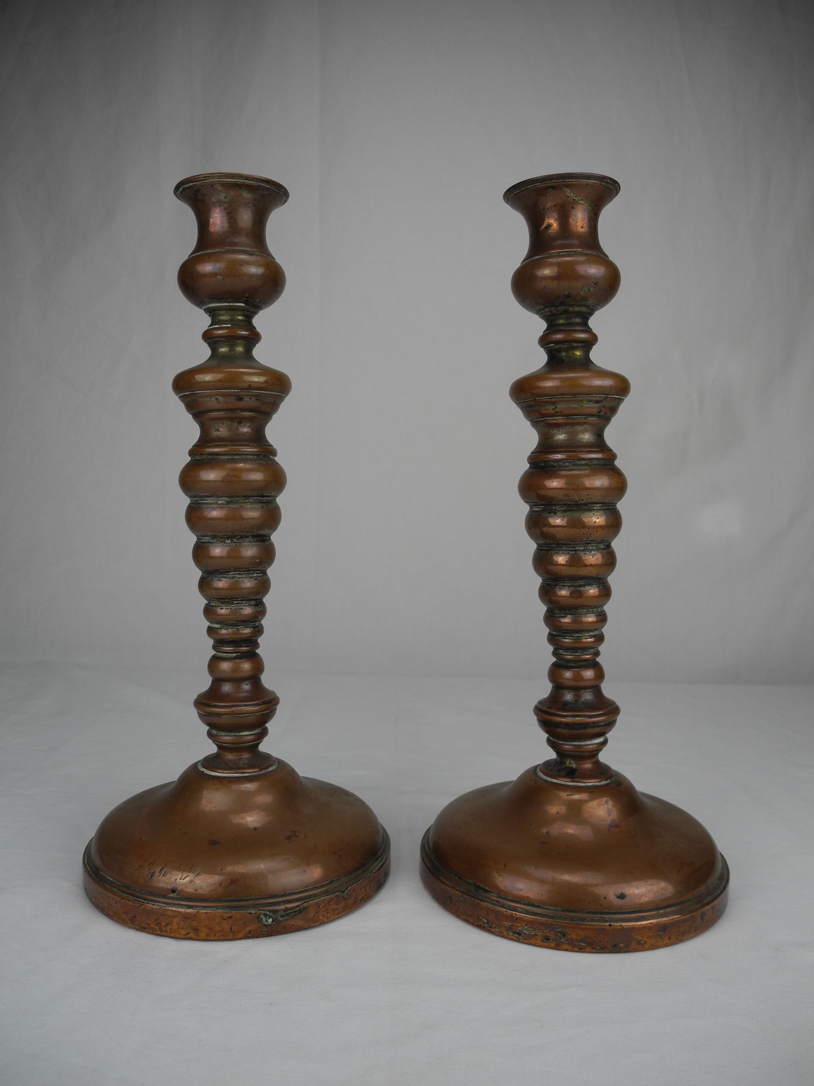 Pair of French copper candlesticks, 19th century