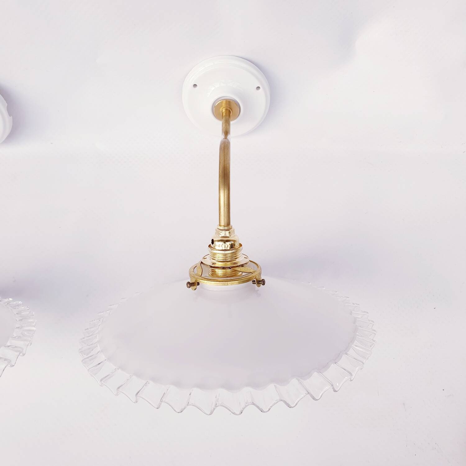 Swan neck and serrated opaline wall lights