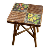 Rattan and ceramic coffee table attributed to Audoux and Minnet.
