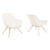 Pair of cocktail armchairs in gilded brass. 1960s.