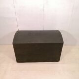 Large travel trunk in blackened wood