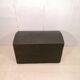 Large travel trunk in blackened wood