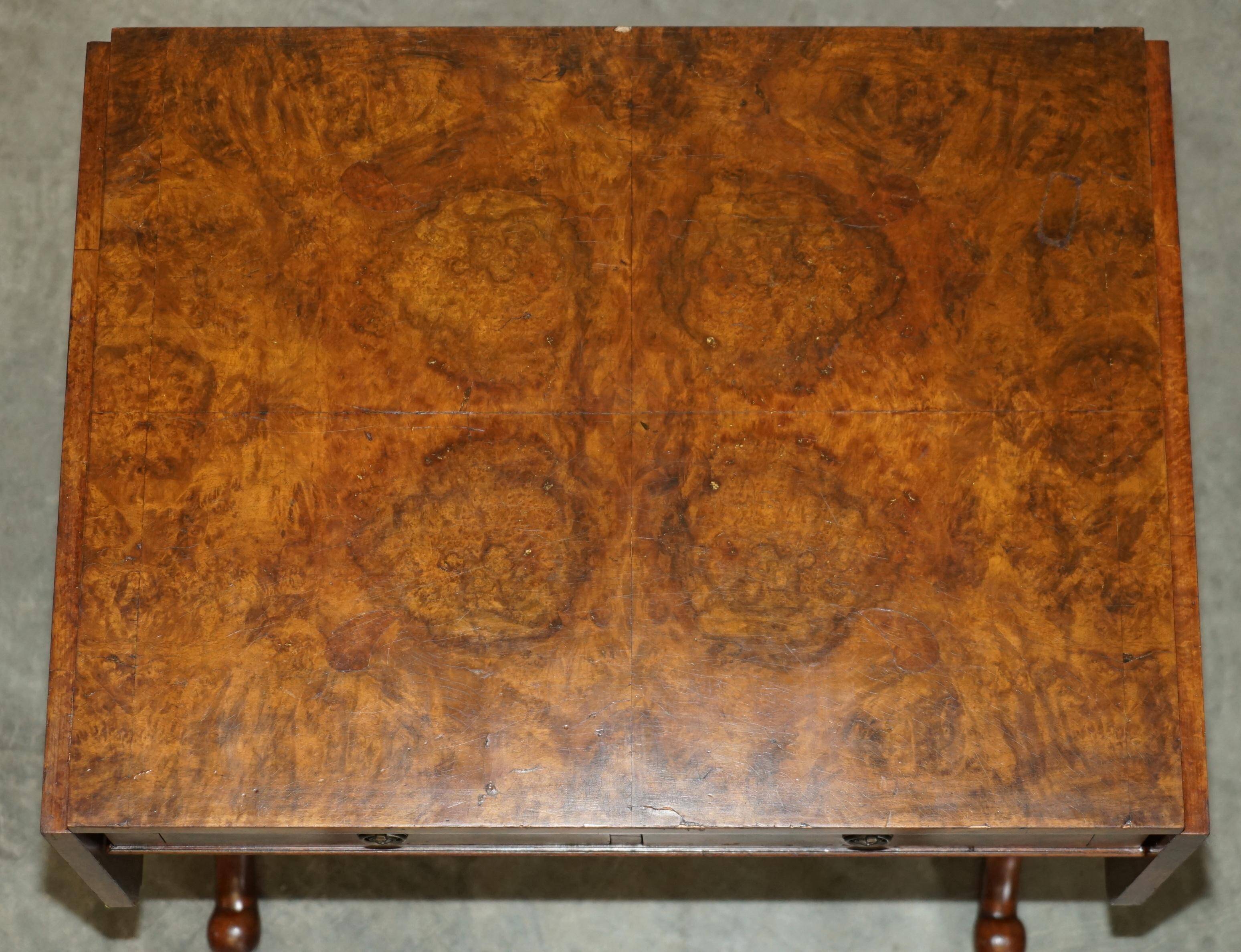 Antique extendable coffee table circa 1880 in solid walnut.