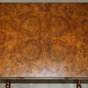 Antique extendable coffee table circa 1880 in solid walnut.