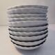 10 small dishes / ramekins / shell-shaped cups. French porcelain