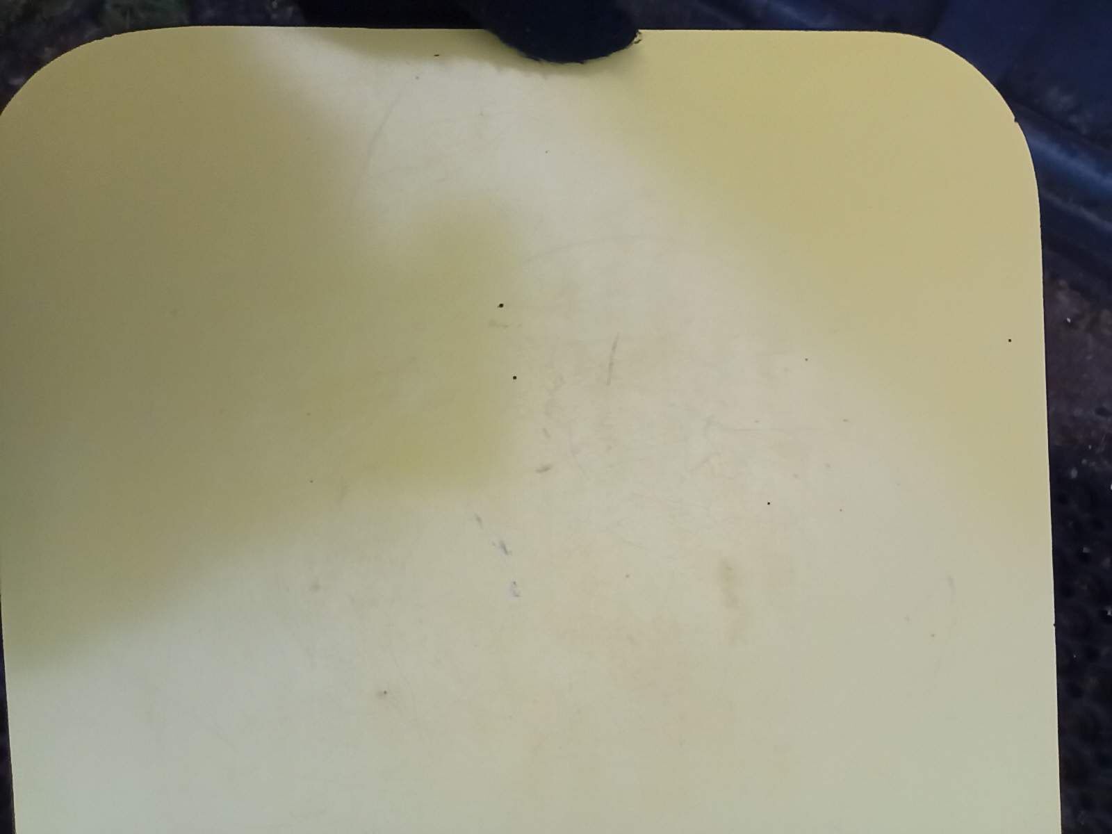 Oak stool and yellow formica