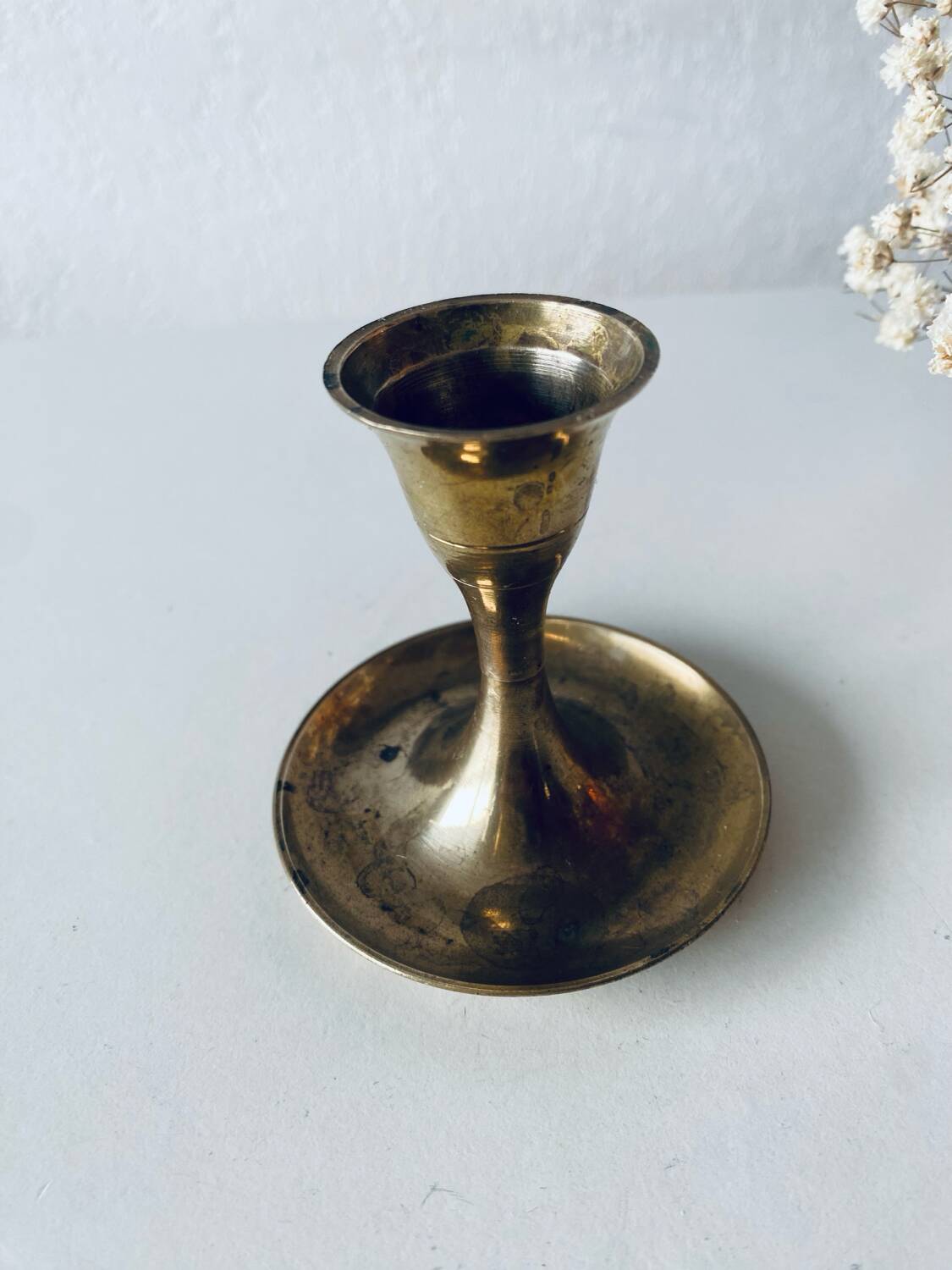 Golden brass candle holder