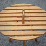 Vintage coffee table, wooden table with central handle, interior decoration, terrace, patio