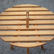 Vintage coffee table, wooden table with central handle, interior decoration, terrace, patio