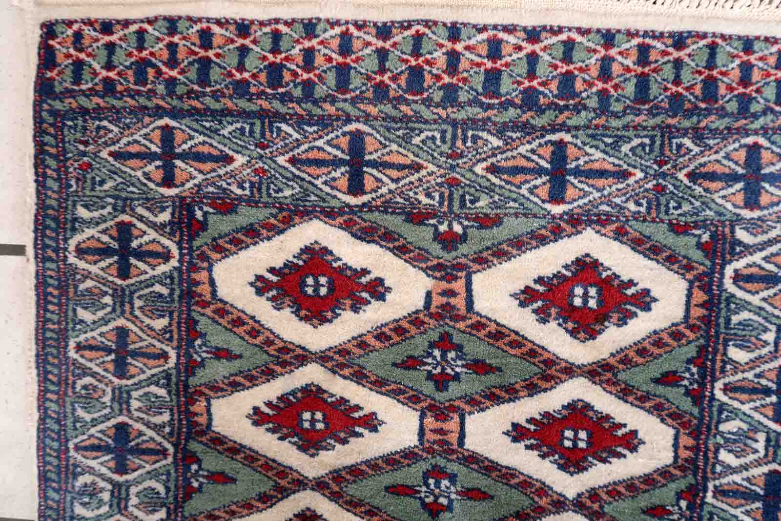 Handmade vintage rug Uzbek Bukhara 56cm x 83cm 1970s