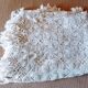 Scalloped bed top in crocheted ecru cotton
