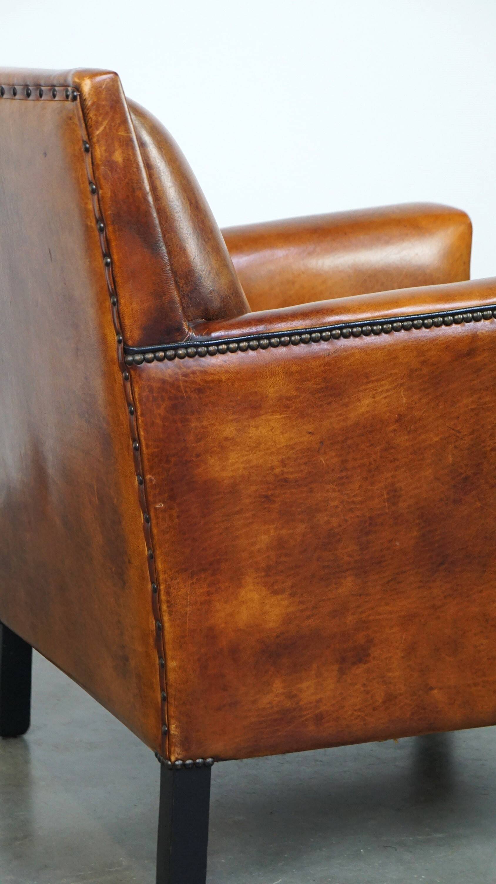 Sleek sheepskin Art Deco design armchair with beautiful details