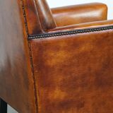 Sleek sheepskin Art Deco design armchair with beautiful details