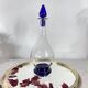 Art Deco glass carafe with glass stopper and blue base 0.7 l