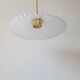 Serrated opaline suspension