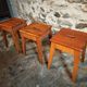 Set of 3 vintage French wooden stools from the 1950s.