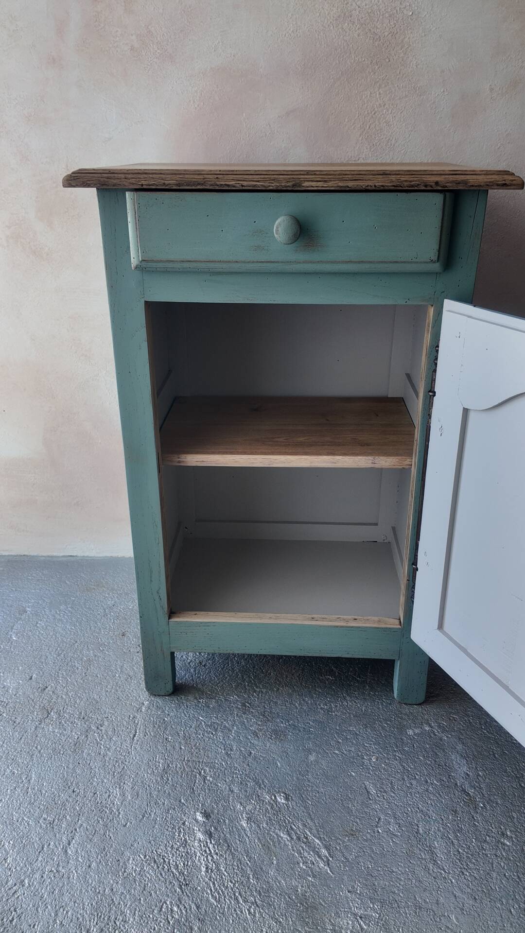 Small vintage side table in sage green patina and solid wood.