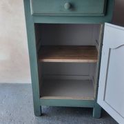 Small vintage side table in sage green patina and solid wood.