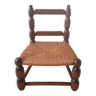 Child's chair in the style of Charles Dudouyt.