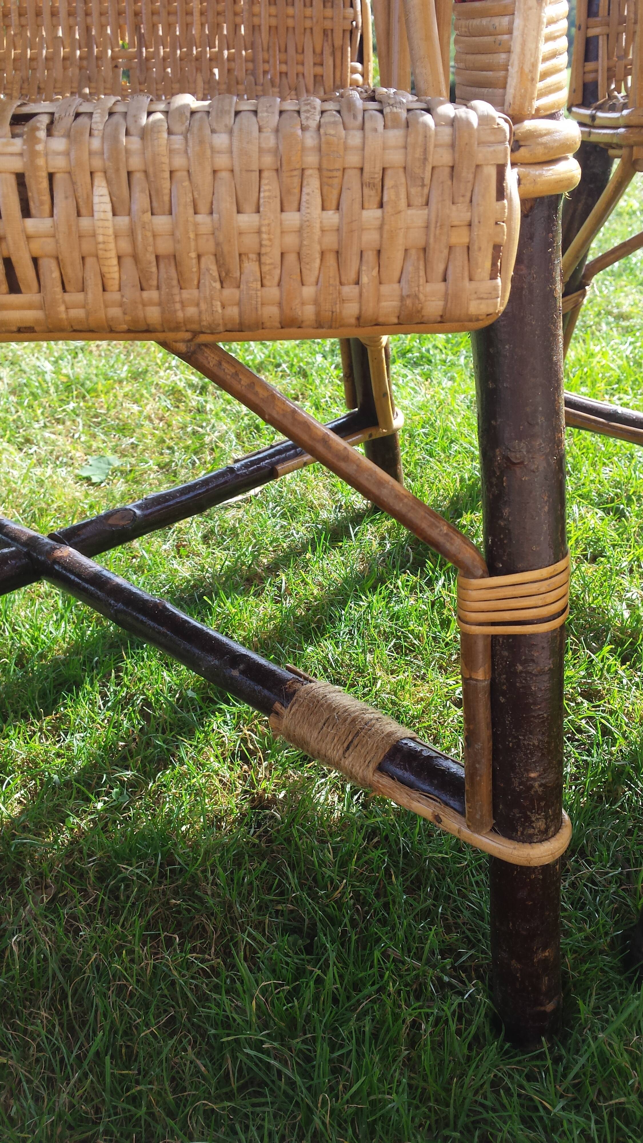 Wicker or rattan armchairs and bamboo