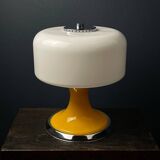 Mid-century Italian yellow table lamp from the 1970s.