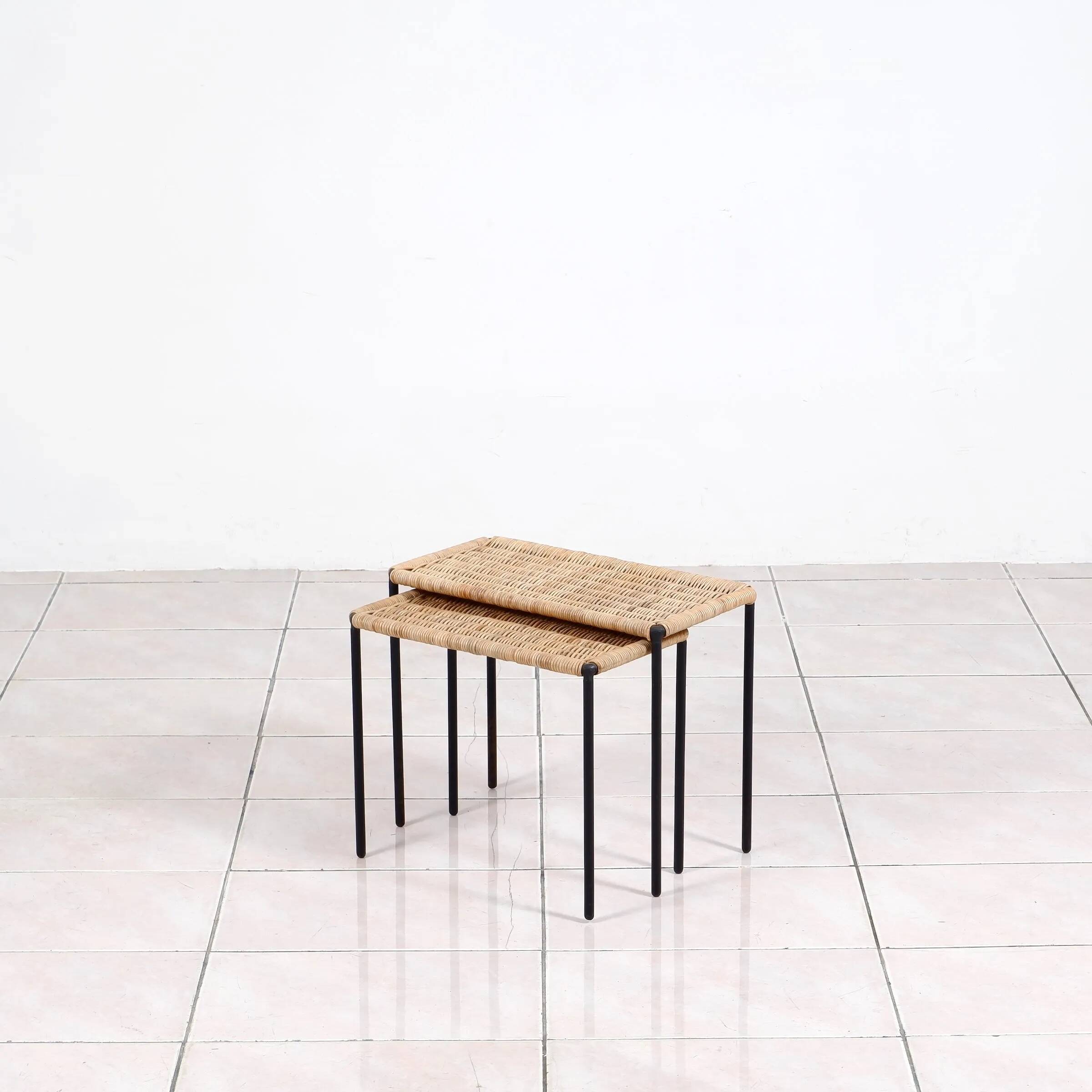 Nesting tables in metal / rattan by Carl Auböck