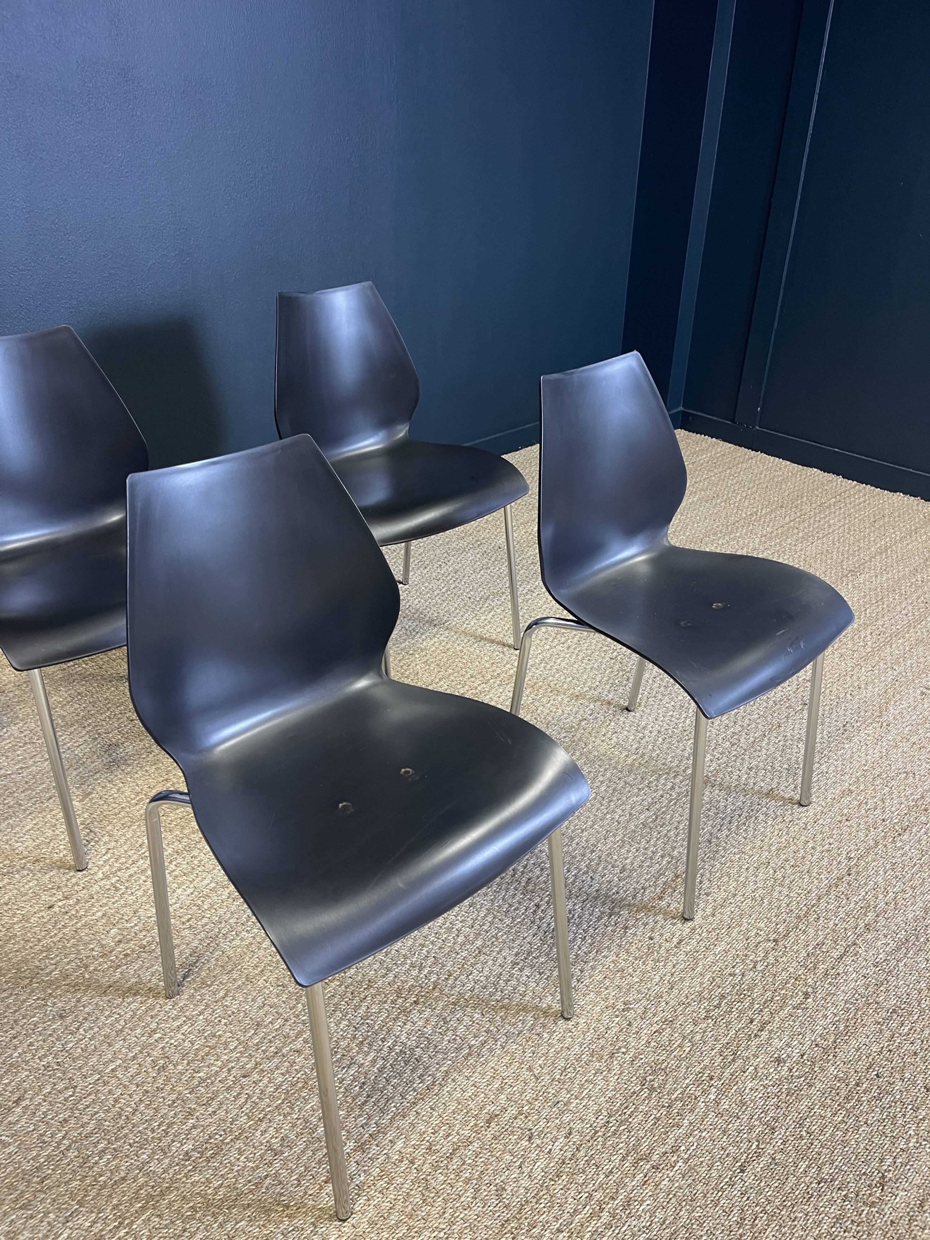 Set of 4 black dining room chairs from the 2000s