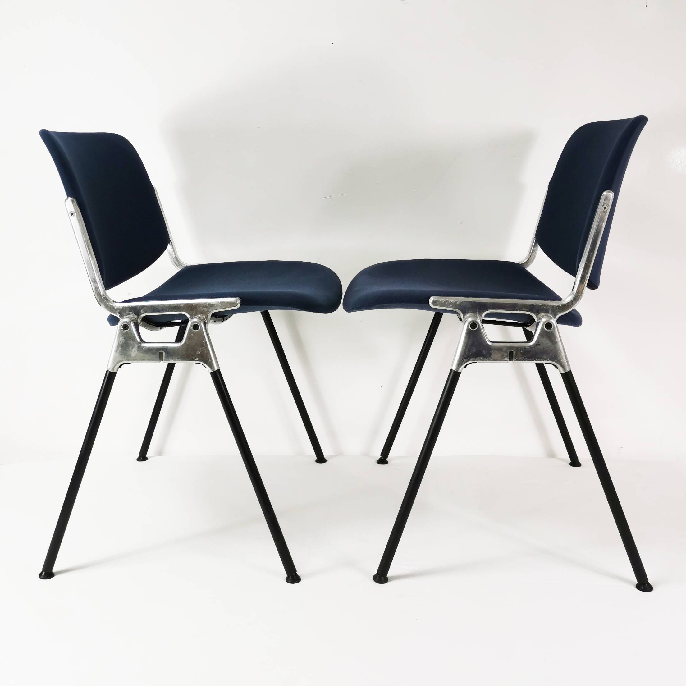 Pair of modernist chairs, Anonima Castelli, designed by G. Piretti, Italy