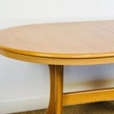 Vintage oval dining room table with extension