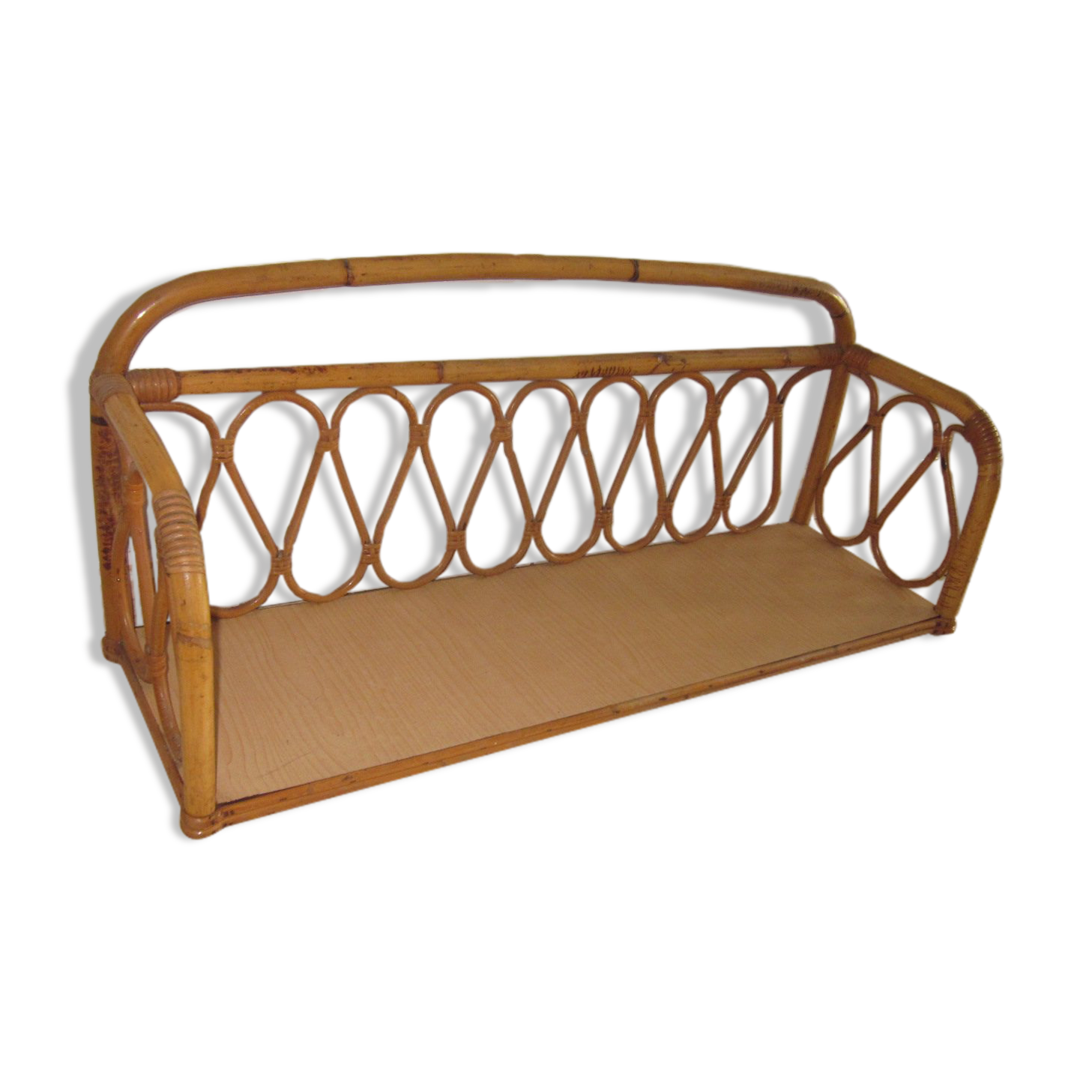 Shelf in rattan of the years 60