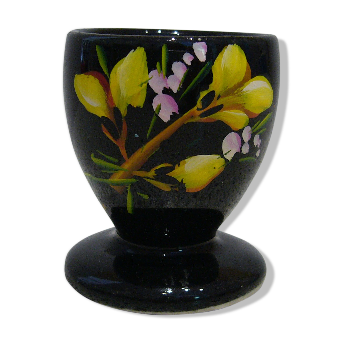 Black egg cup with hand-painted floral decoration