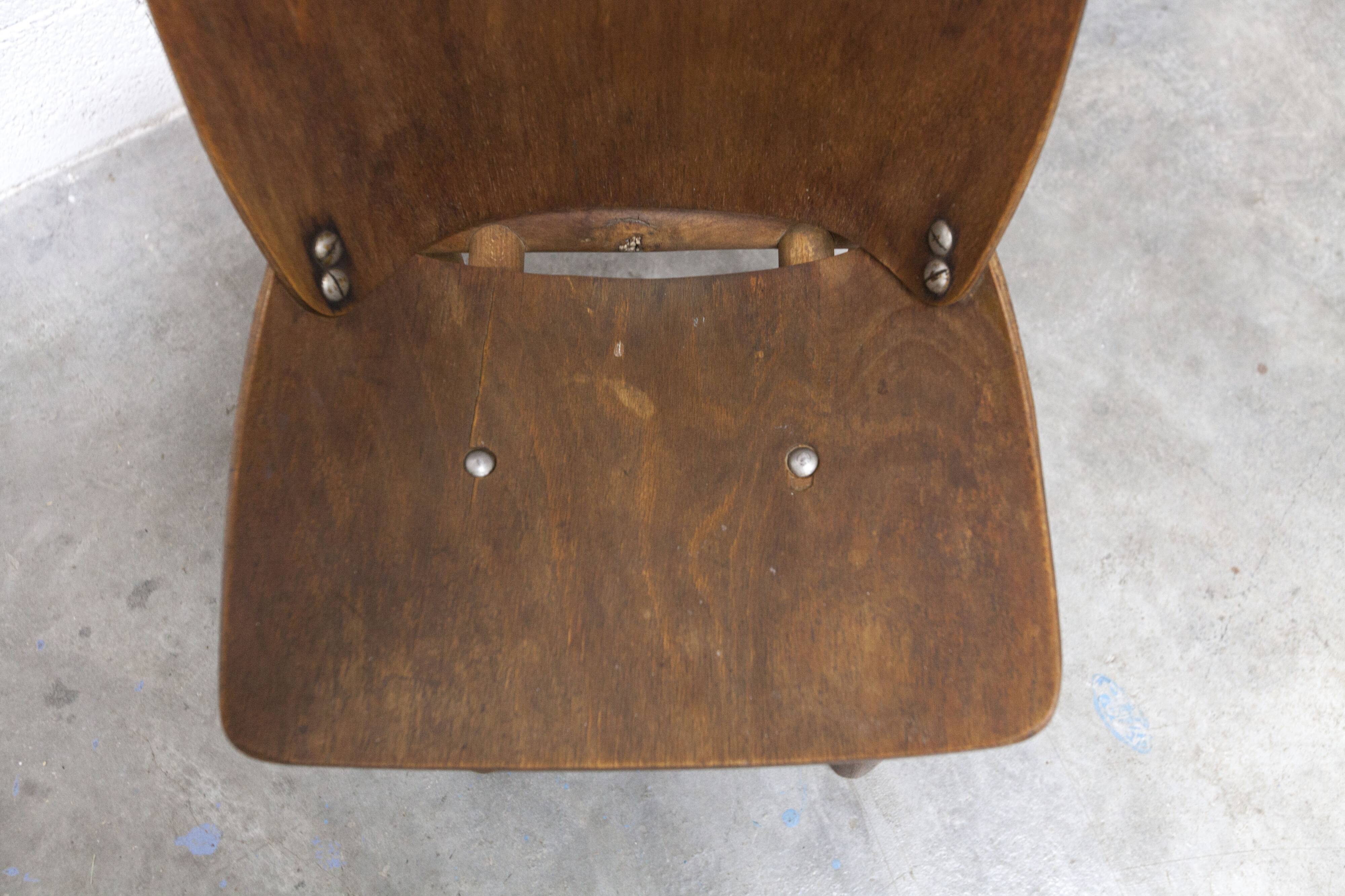 Atypical 1960s curved wood children's chair