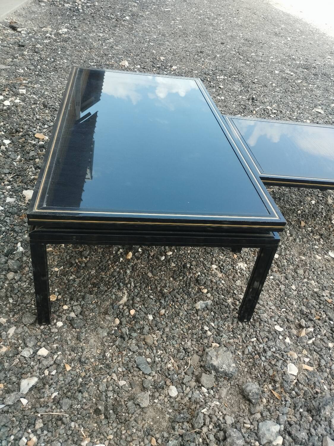Vintage metal coffee table with glass top.