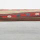 Oriental pouf upholstered in an antique kilim