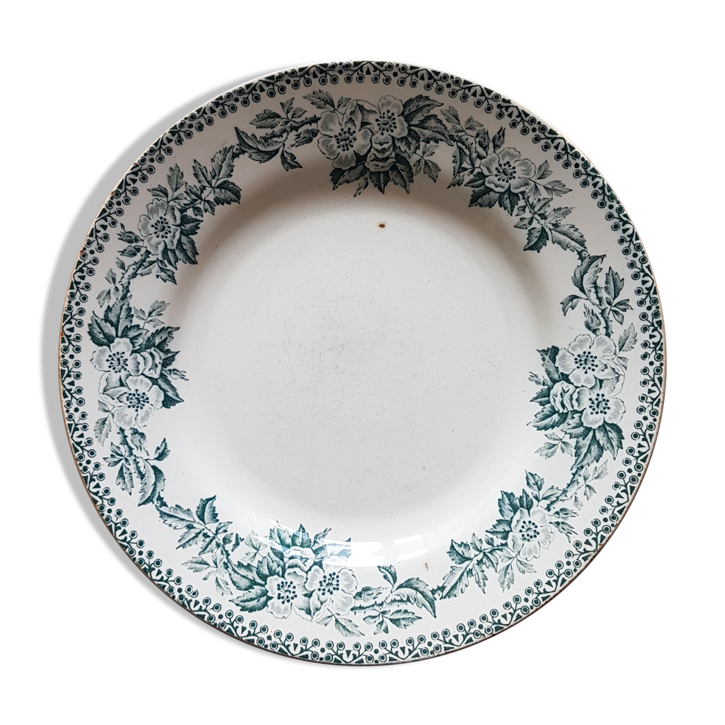 Old plate with wreath decoration