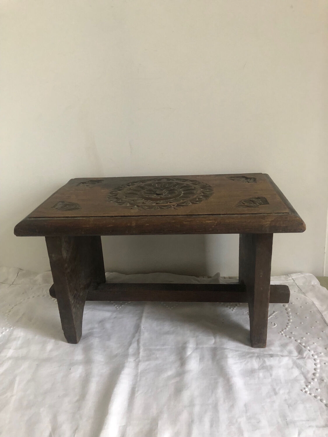 Old small hand-carved bench