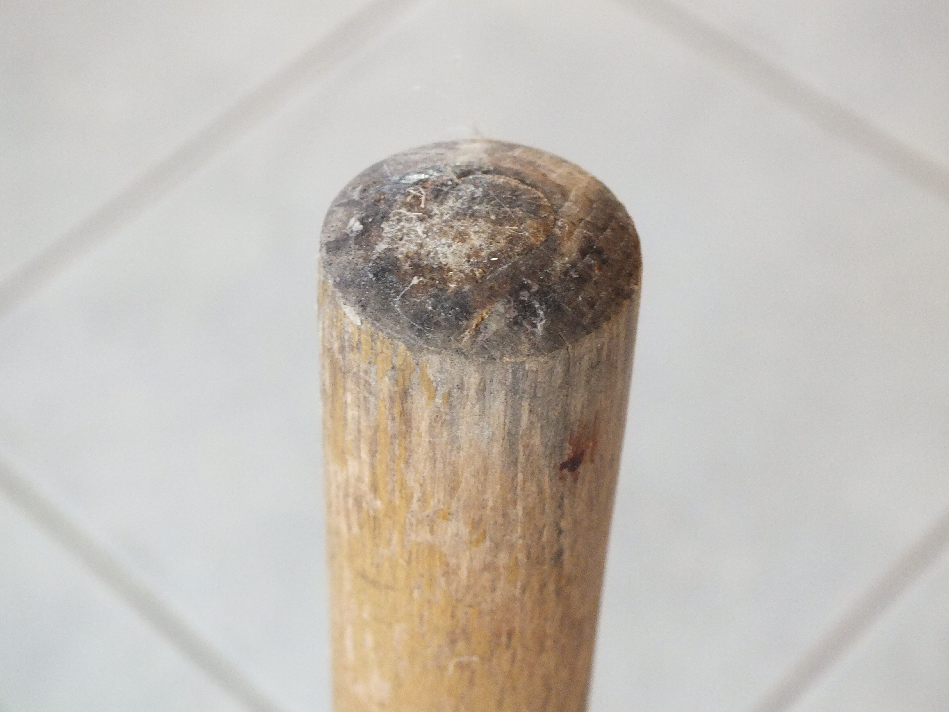 Vintage stool in patinated natural wood