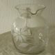 Glassware, including a jug and engraved crystal carafe.