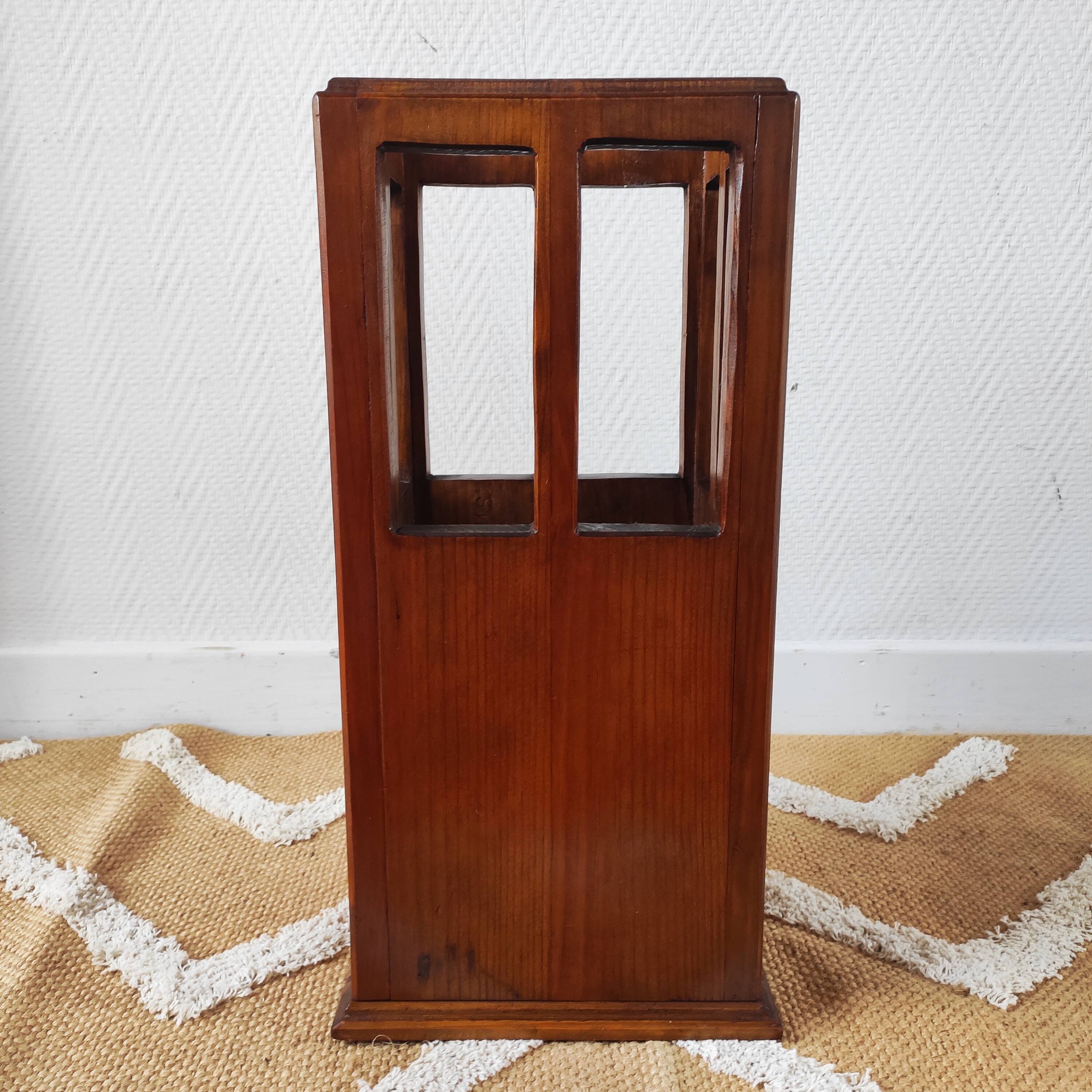 Vintage brutalist umbrella stand made of solid wood.