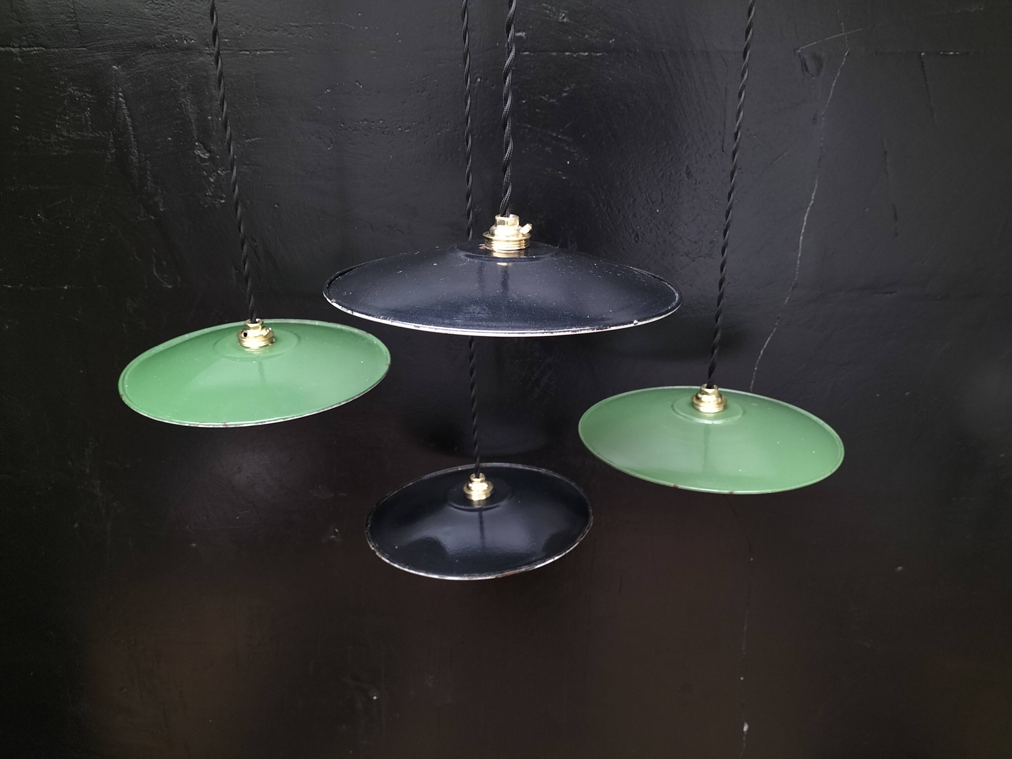 4 enameled sheet metal pendants