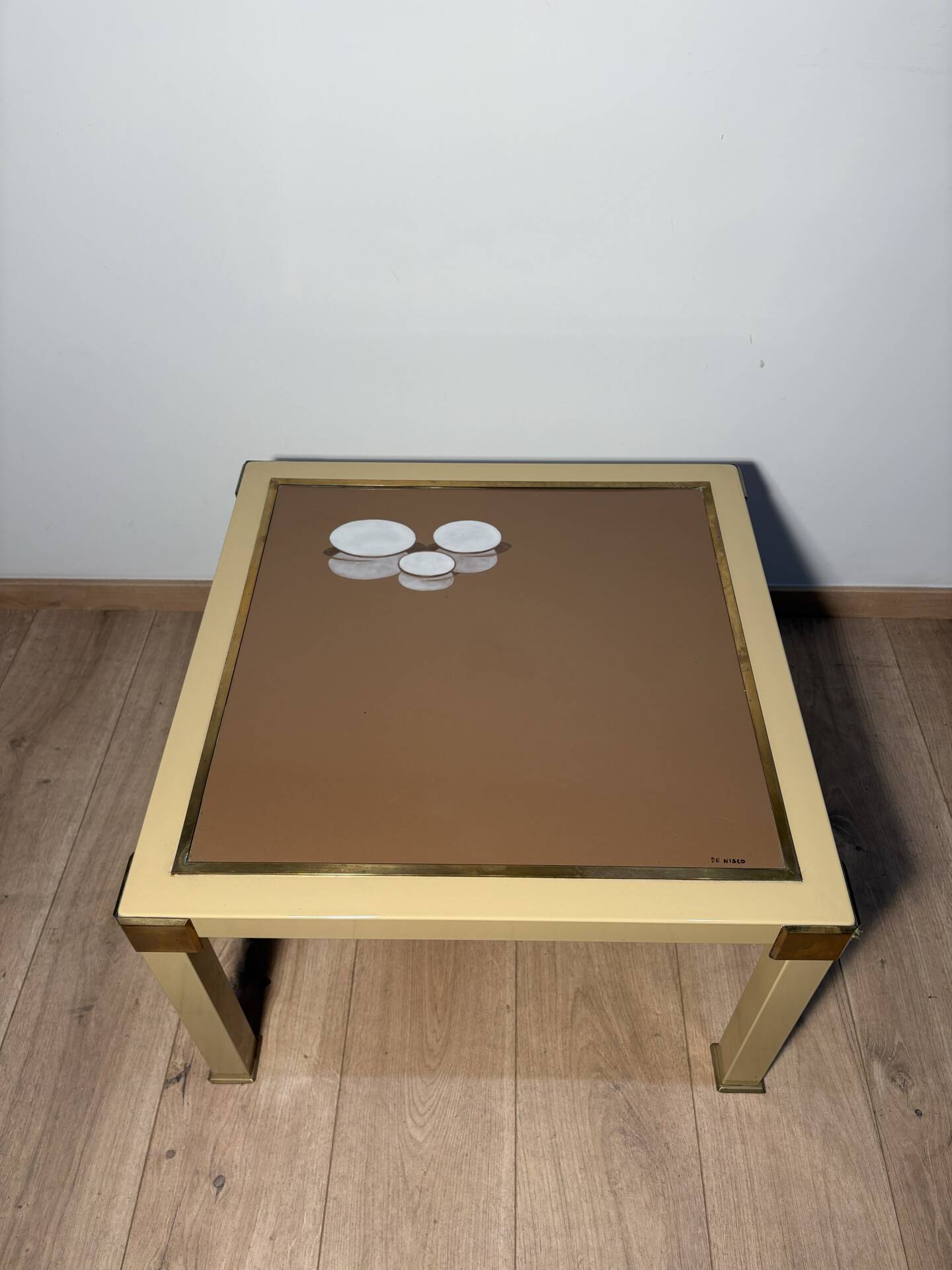 Metal and brass coffee table in ceramic by Nisco.