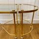 Table basse tripartite en laiton et verre
