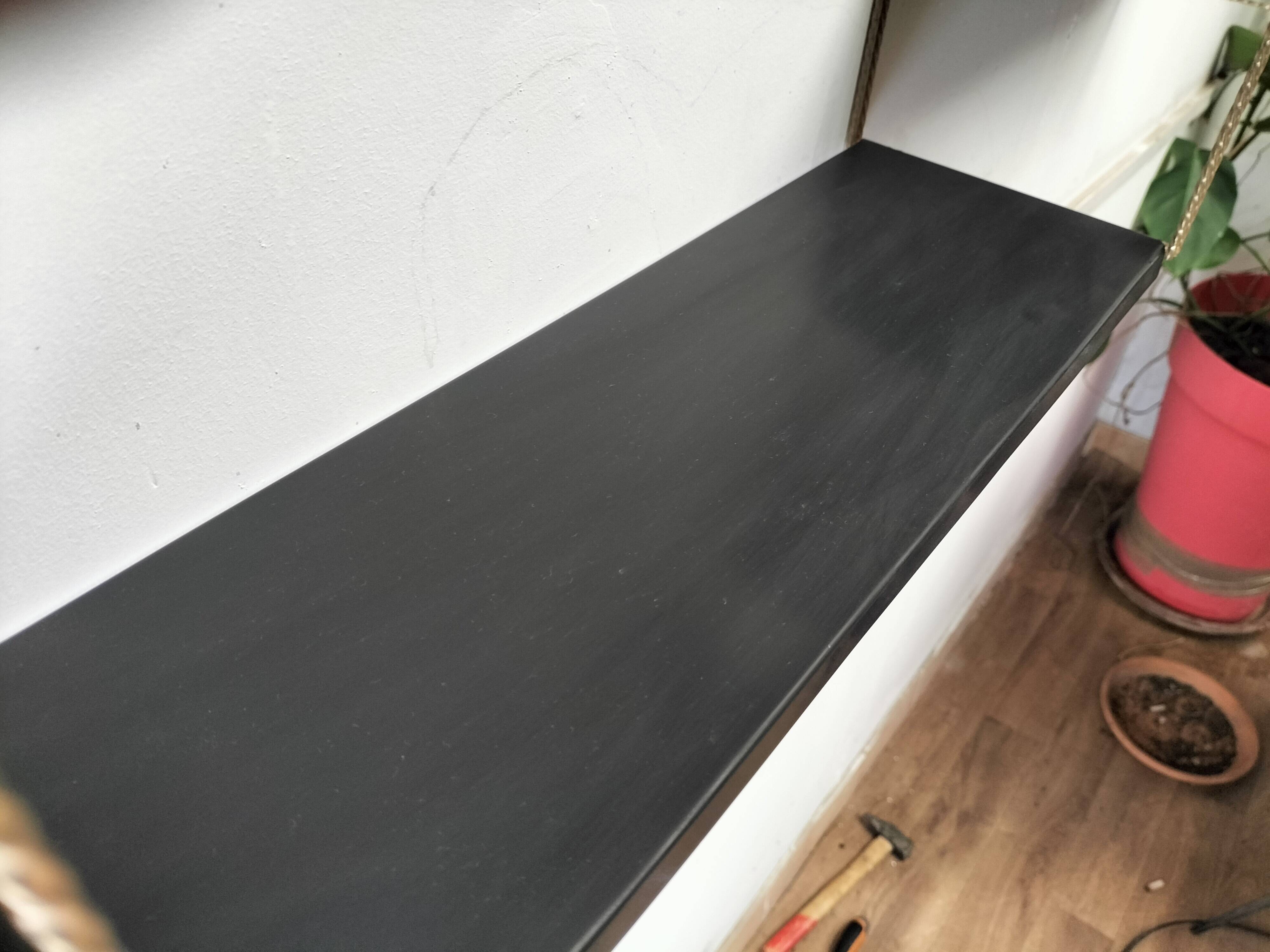 Modular black metal shelf