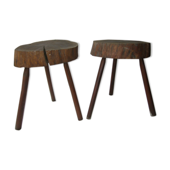 Two raw wooden tripod stools