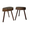 Two raw wooden tripod stools