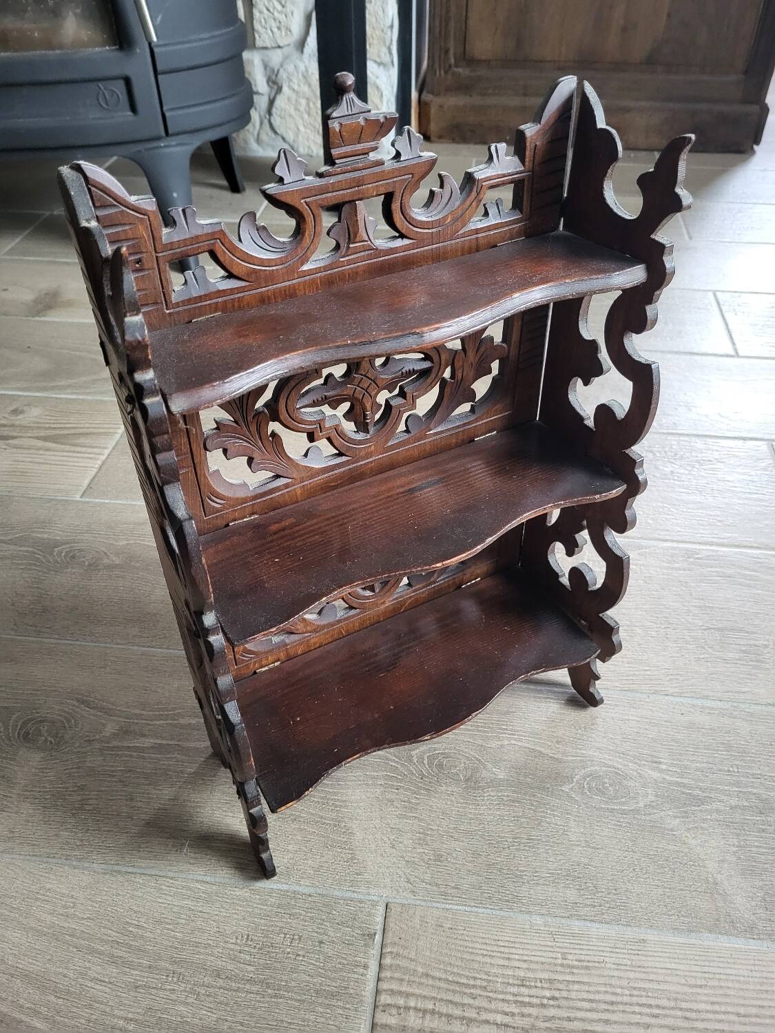 Small carved wooden shelf