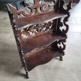 Small carved wooden shelf