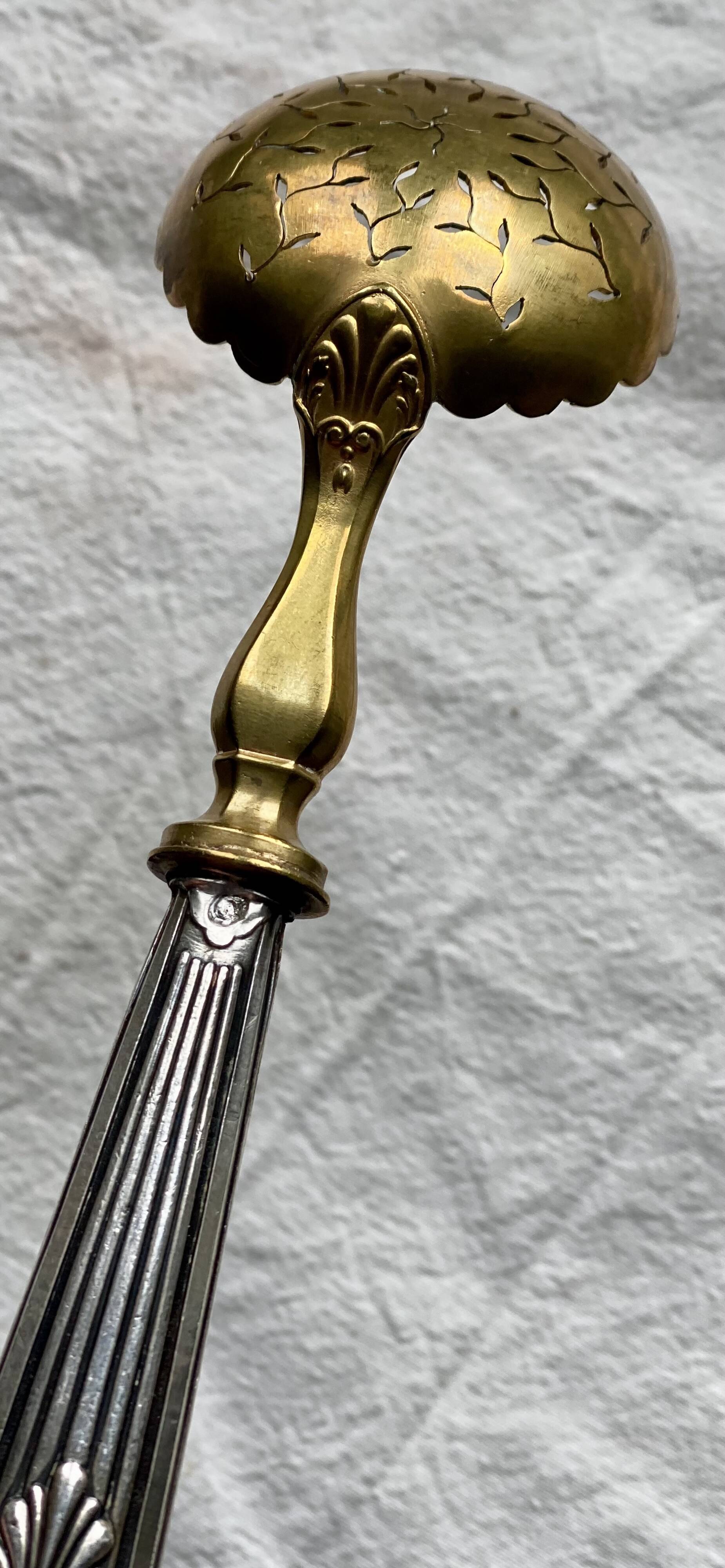 Silver sugar sifter spoon, 19th century.