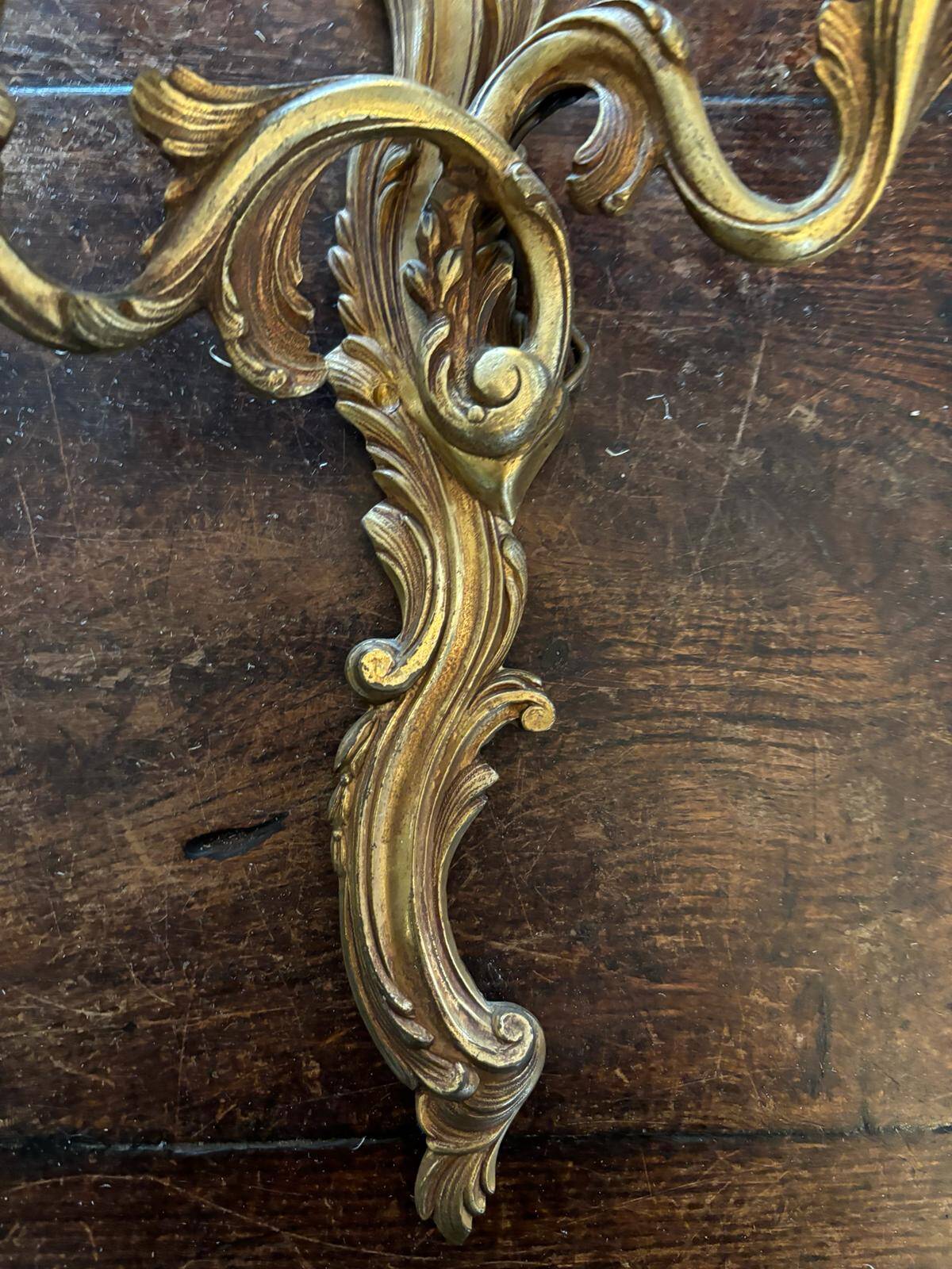 Pair of Louis XV Style wall lights in gilded bronze