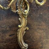 Pair of Louis XV Style wall lights in gilded bronze